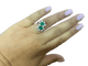 54 Bague cocktail en or blanc, émeraude colombienne et diamants 58 Facettes BA 461