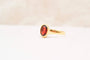 51 Bague solitaire ovale en or jaune et grenat 58 Facettes 4078
