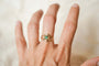 56 Art Nouveau - Bague en or jaune 18 carats, pierre verte et demi-perles 58 Facettes 3596