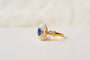 50 Bague marguerite ovale en or jaune, saphir et diamants 58 Facettes 4173