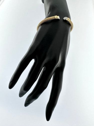 Bracelet ouvert italien en or 18 carats et diamants 58 Facettes BR1512