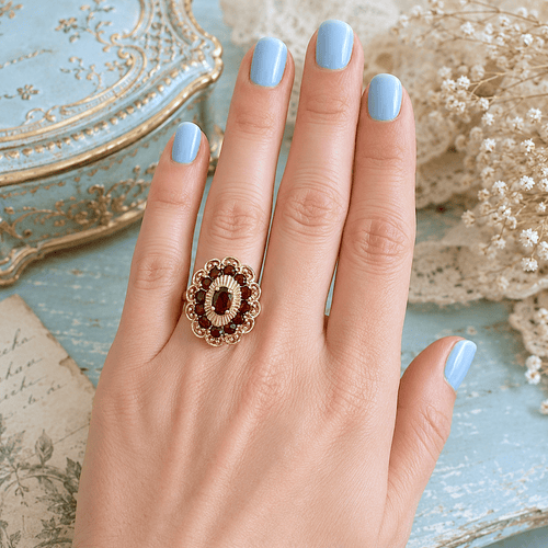 55.5 Bague dôme vintage en or jaune 18K et grenats 58 Facettes 1791