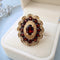 55.5 Bague dôme vintage en or jaune 18K et grenats 58 Facettes 1791