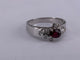 53.5 Bague ovale en or blanc, rubis et diamant 58 Facettes BA 226