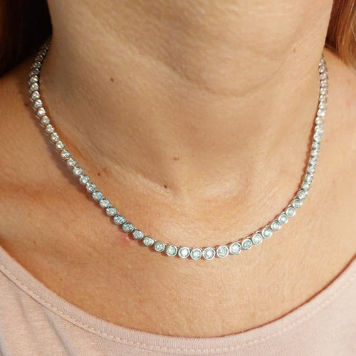 Collier Collier tennis en or blanc et diamants 6,46 ct 58 Facettes G4001