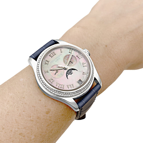 Patek Philippe Annual Calendar - Montre en or blanc, nacre et diamants 58 Facettes 35856
