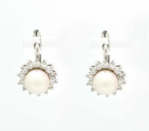 Boucles d'oreilles en or blanc avec perles et diamants 0,70 ct 58 Facettes 9269
