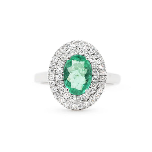 53 Bague en or blanc 18 kt avec émeraude et diamants 58 Facettes 17956