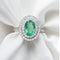 53 Bague en or blanc 18 kt avec émeraude et diamants 58 Facettes 17956