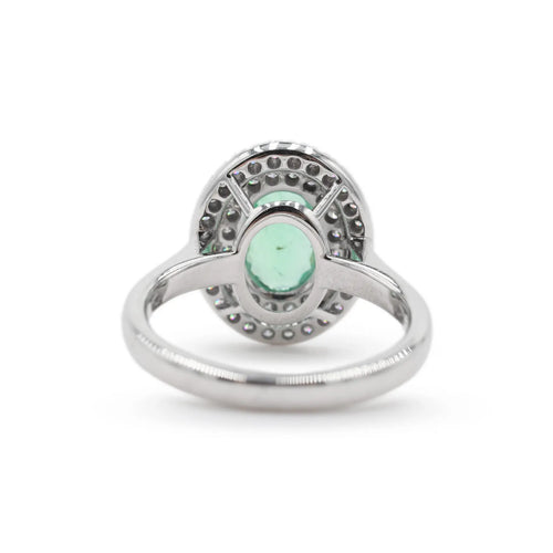 53 Bague en or blanc 18 kt avec émeraude et diamants 58 Facettes 17956