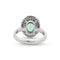 53 Bague en or blanc 18 kt avec émeraude et diamants 58 Facettes 17956
