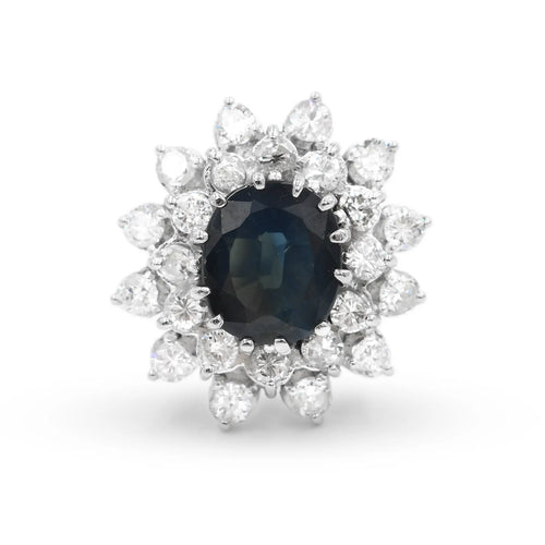 55 Bague en or blanc, saphir australien ovale et diamants 58 Facettes 18970