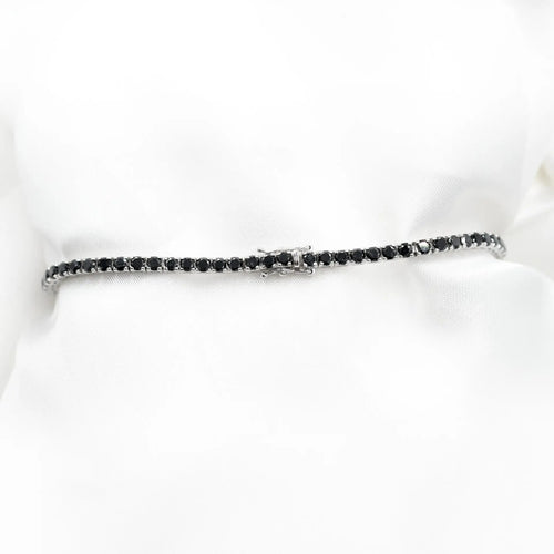 Bracelet tennis en or blanc 18 carats et diamants noirs 58 Facettes 21462