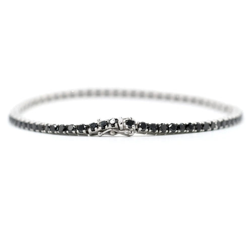 Bracelet tennis en or blanc 18 carats et diamants noirs 58 Facettes 21462