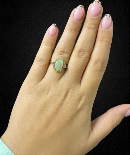 Bague Bague - opale arlequin et diamants en or jaune 58 Facettes