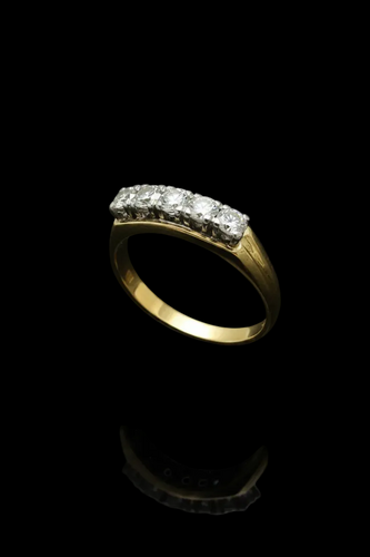Bague 60 Bague rivière années 1930 en or jaune 18k et diamants 58 Facettes