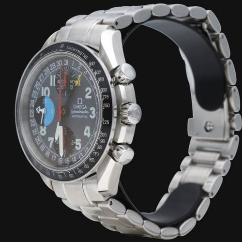 Omega Speedmaster - Montre Day-Date chronographe en acier 58 Facettes MT47408