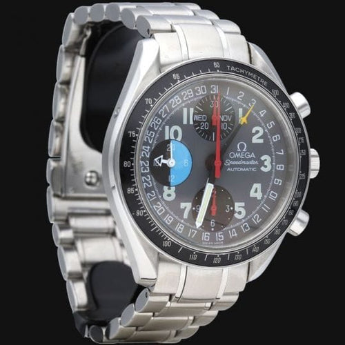 Omega Speedmaster - Montre Day-Date chronographe en acier 58 Facettes MT47408