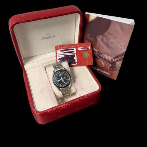 Omega Speedmaster - Montre Day-Date Chronograph en acier 58 Facettes MT47892