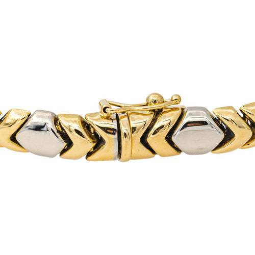 Bracelet en or jaune et or blanc 58 Facettes 5568998CN