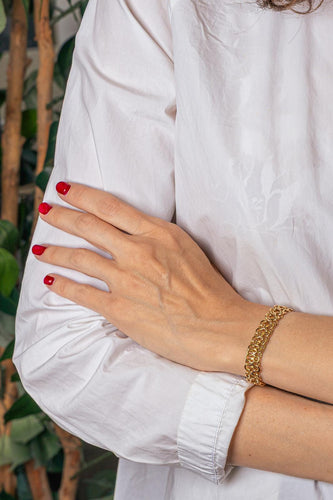 Bracelet maille souple en or jaune 58 Facettes 5714312CN