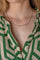 Collier maille figaro en or jaune 58 Facettes 5773955CN