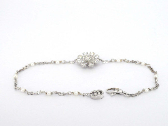 Gucci Flora - Bracelet en or blanc, diamants et perles 58 Facettes 3103