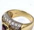 54 Bague en or jaune 18 ct avec rubis et diamants 58 Facettes 774 D OC