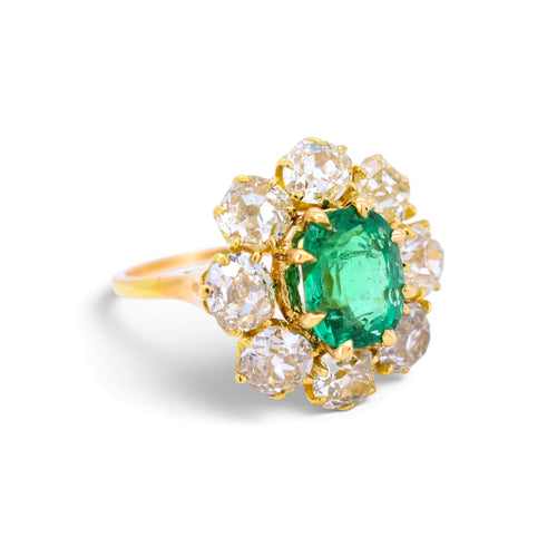 https://cdn.shopify.com/s/files/1/1015/8633/8124/files/vintage-18k-gold-pompadour-zambian-emerald-diamond-ring-right.jpg?v=1785510316