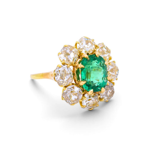 https://cdn.shopify.com/s/files/1/1015/8633/8124/files/other-vintage-18k-gold-pompadour-zambian-emerald-diamond-ring-right.jpg?v=1785510338