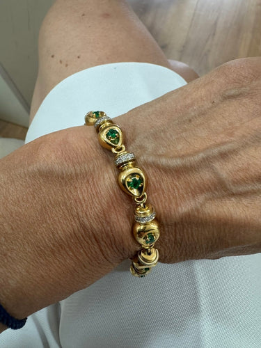 Bracelet en or 750/1000, émeraudes et diamants 58 Facettes Bracelet