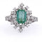 54 Bague en or blanc 18 kt avec émeraude et diamants 58 Facettes AN730 (0599)