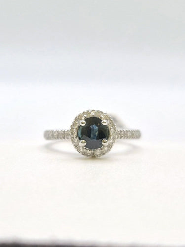 51 Solitaire Halo - Bague en or gris avec saphir teal et diamants 58 Facettes 324.201