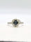 51 Solitaire Halo - Bague en or gris avec saphir teal et diamants 58 Facettes 324.201