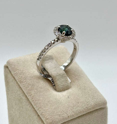 51 Solitaire Halo - Bague en or gris avec saphir teal et diamants 58 Facettes 324.201