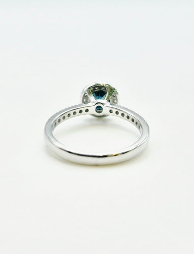 51 Solitaire Halo - Bague en or gris avec saphir teal et diamants 58 Facettes 324.201