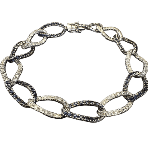 Bracelet en or blanc, diamants et saphirs 58 Facettes BRA4525