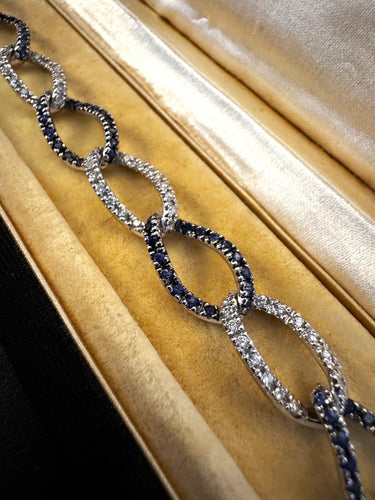 Bracelet en or blanc, diamants et saphirs 58 Facettes BRA4525