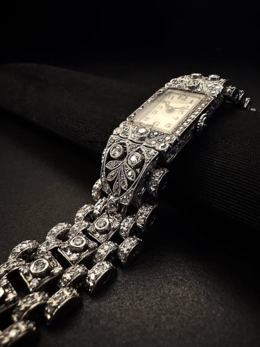 Liberty - Montre en platine, or blanc et diamants 58 Facettes ORL4523PT