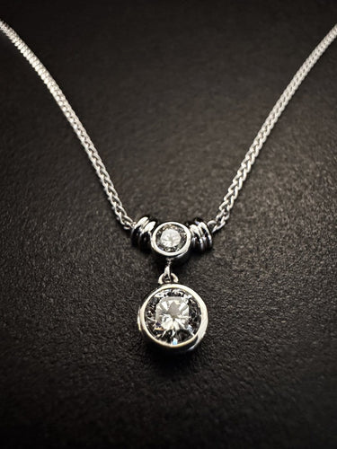 Pendentif en or blanc 18K et diamants 58 Facettes PEN40105KT