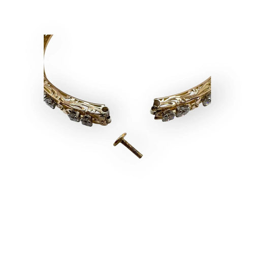 Bracelet jonc ouvrant ajouré en or jaune et diamants 58 Facettes 330095645