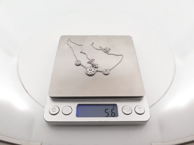 Christian Dior Rose des Vents - Collier 3 motifs en or blanc et diamants 58 Facettes 276467