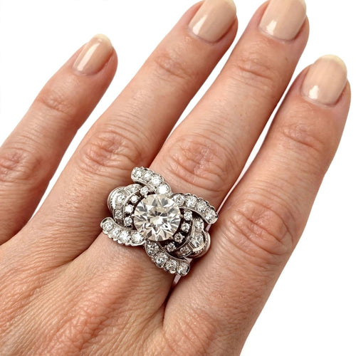 vintage_diamond_ring_hand.webp