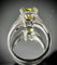 52 Bague trois pierres en or blanc, diamant jaune et diamants trapèze 58 Facettes Bague 50