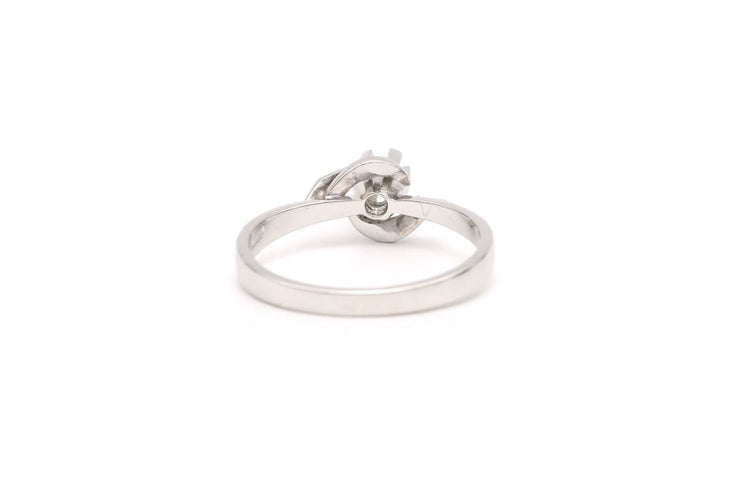53 Bague Années 50 en or blanc 18 carats et diamant 58 Facettes 22910