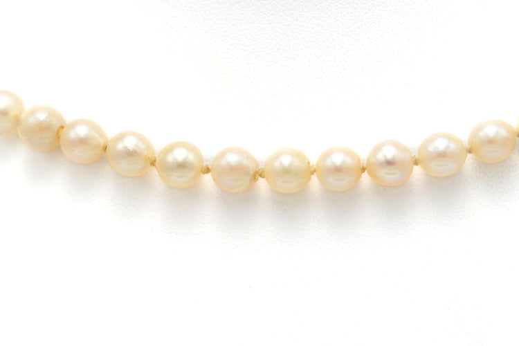 Collier années 70 en or blanc, perles et rubis 58 Facettes B278