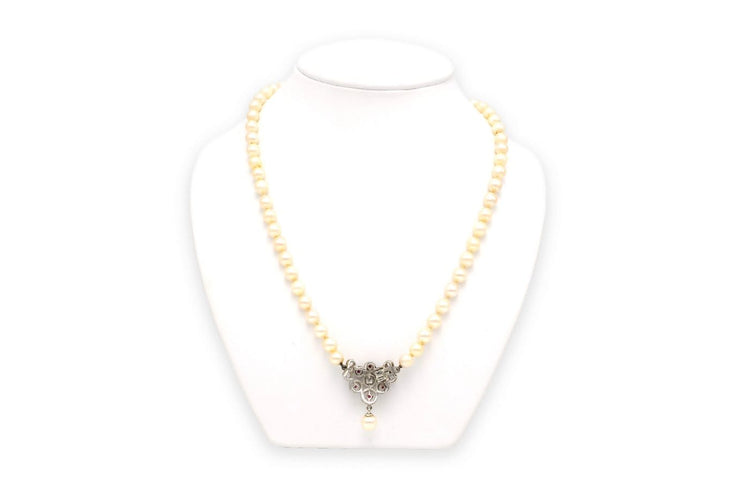 Collier années 70 en or blanc, perles et rubis 58 Facettes B278