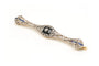 Broche Art Déco en or jaune et blanc, onyx, saphirs et diamants 58 Facettes 23114