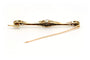 Broche Art Déco en or jaune et blanc, onyx, saphirs et diamants 58 Facettes 23114