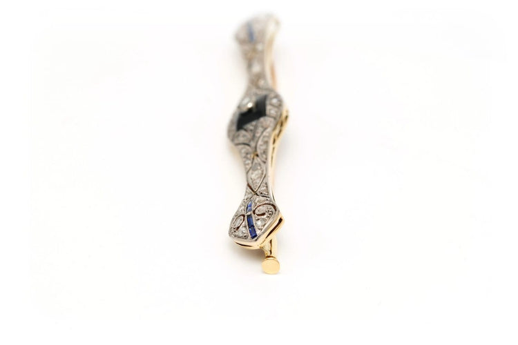 Broche Art Déco en or jaune et blanc, onyx, saphirs et diamants 58 Facettes 23114